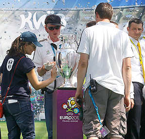 Feminist protesters from Ukraine tried to snatch the Euro 2012 trophy when it was put on public display.